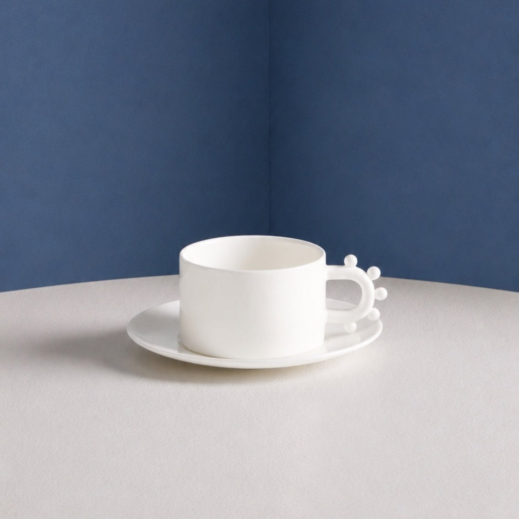 Tasse et soucoupe Pomponette en porcelaine – blanc — Joruniq